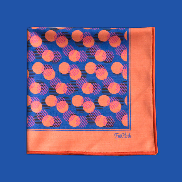 Playful FatCloth Blinky red and blue pocket square in vibrant dot pattern