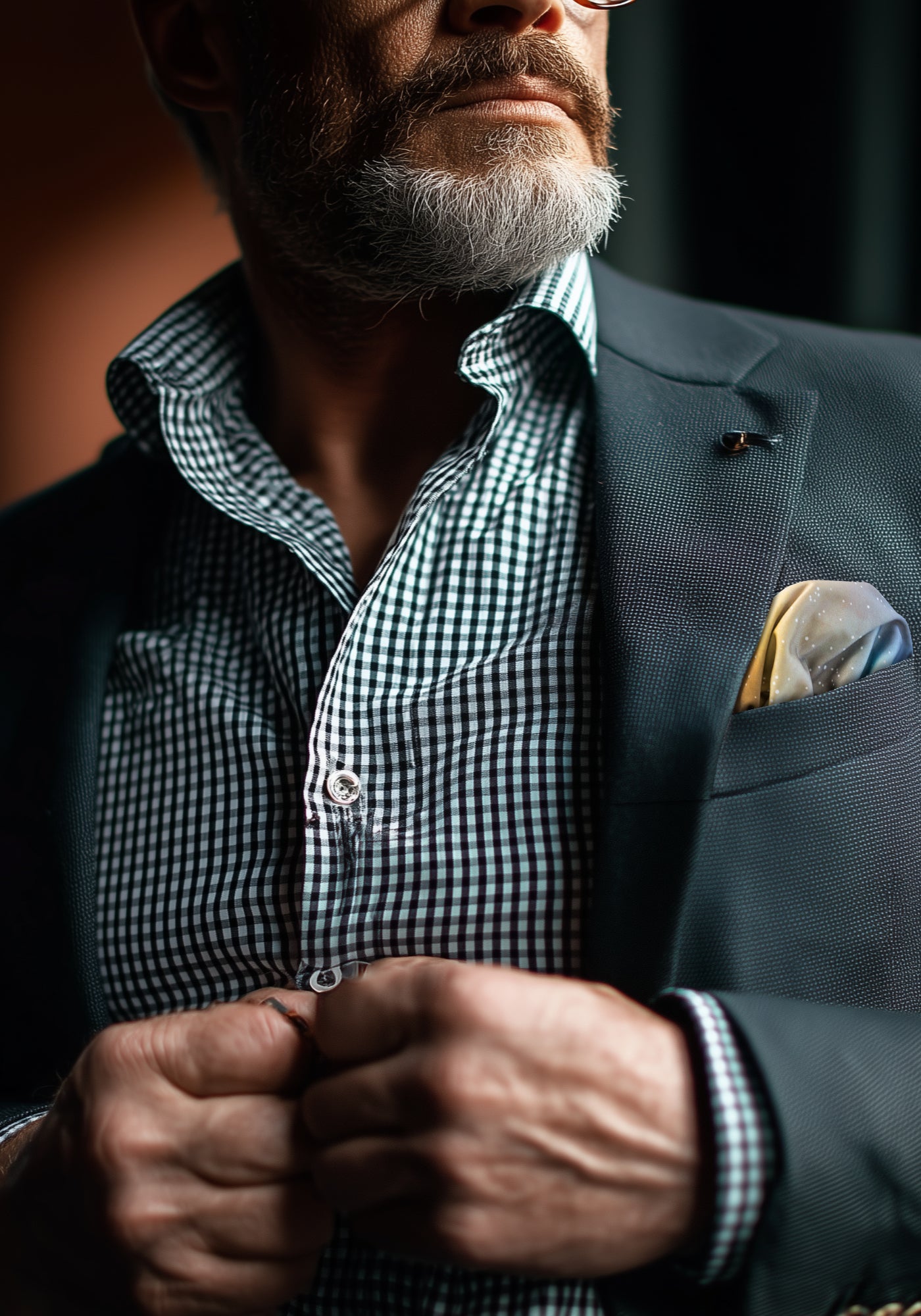 Gentleman wearing a checkered shirt and astral FatCloth Esko pocket square