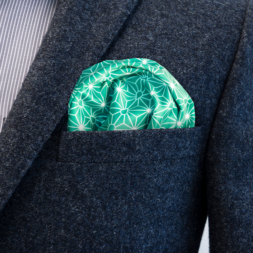 Traditional Japanese Asanoha patterned FatCloth Issei Green multipurpose pocket square puff fold in gray blazer pocket