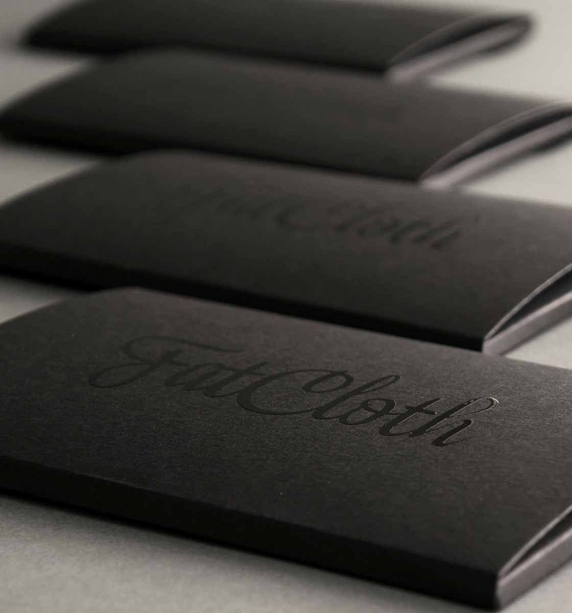 Stylish black FatCloth pocket square cardboard sleeves