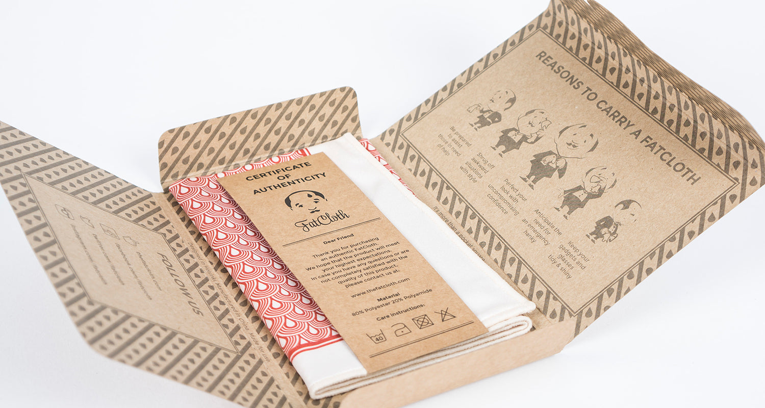 Open Kraft brown FatCloth Originals product box containing white and red pocket square closeup image