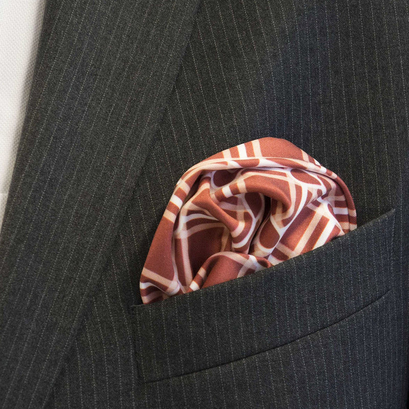 The burgundy tone of Marcus Maroon pocket hankie works great with formal greys, blacks and pin-stripes as well  