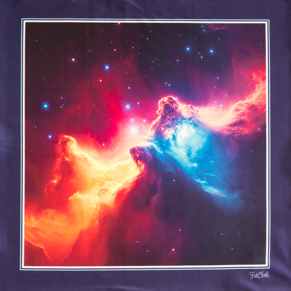 A multipurpose pocket square print featuring a vibrant cosmic nebula design with red, orange, and blue star-forming clouds against a starry dark blue space background, bordered by a thin white line and a dark navy fabric base.