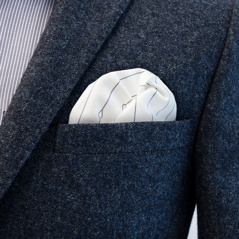 There is hardly a better all-around pocket square than the timeless FatCloth Bernie White. It works with every outfit.