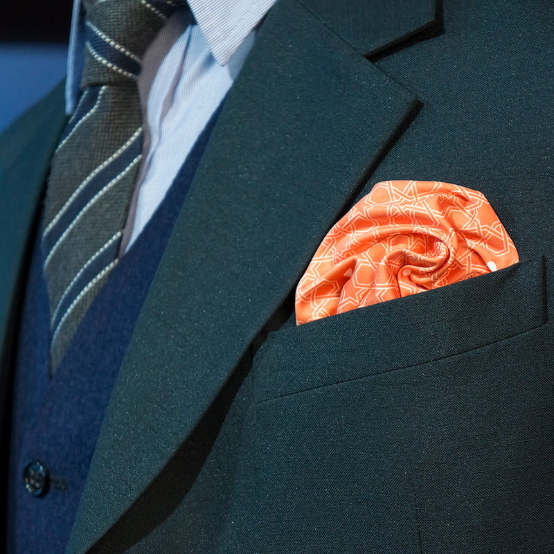Butrus Orange microfiber pocket-handkerchief by FatCloth works great in blue pockets
