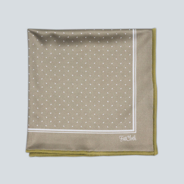 Subtle green FatCloth Daniel Clay is reversible pocket square with patterned and solid color sides