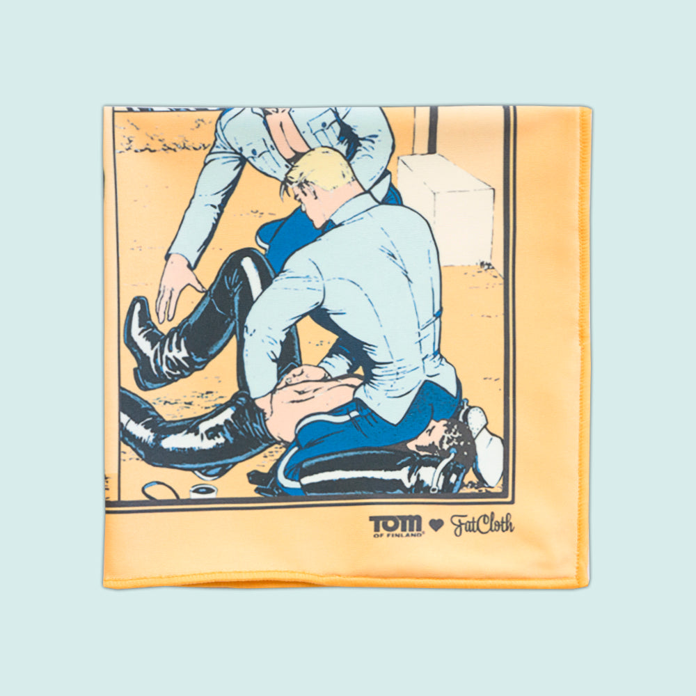 Peachy orange pocket square graphic design of three people wrestling with a FatCloth x Tom brand logo