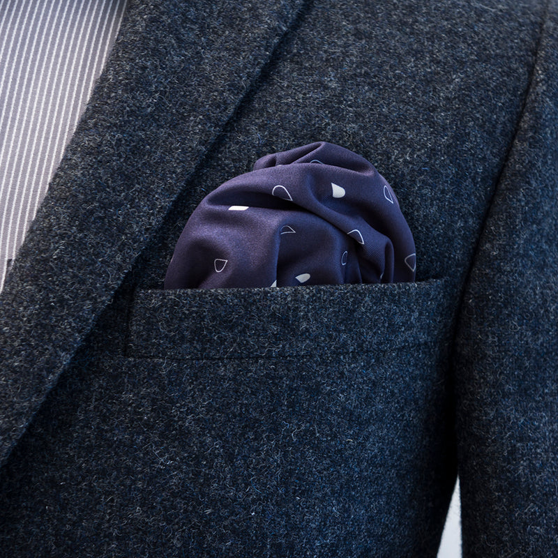 Navy blue FatCloth Earl Ink works best with light brown and tan jackets & blazers as do most of the darker pocket squares