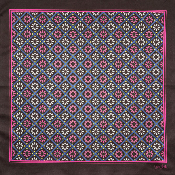 FatCloth Heston Black pocket square’s distinguishable drop wheel pattern in magenta & light blue catches attention