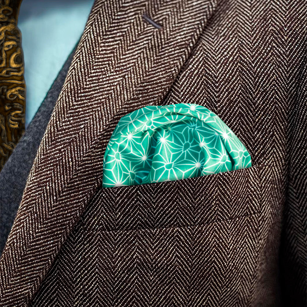 Traditional Japanese Asanoha patterned FatCloth Issei Green multipurpose pocket square puff fold in brown herringbone tweed pocket