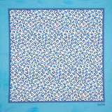 Knut multipurpose pocket-handkerchief by FatCloth depicts imaginary animal print in tones of blue and pale 