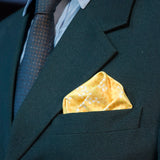 Stylish FatCloth Manuel Yellow pocket square's high contrast pattern pops up nicely from blue background