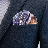 Moomin Shock by FatCloth pocket square’s purple and white colour combination complements blue tones especially well