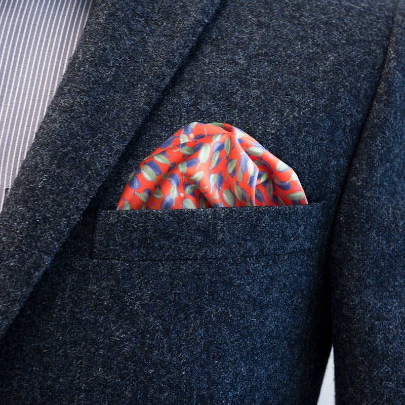 FatCloth Oswald pocket square’s purple, red and green tones bring a splash of contrast to darker pockets
