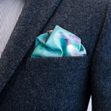 Pocket square FatCloth Oula’s petrol and blue tones play well together with light grey suits