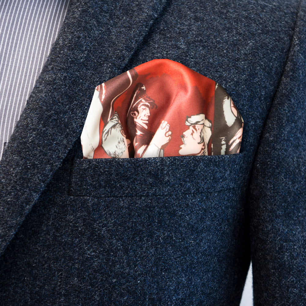 FatCloth Ringo red pocket square puff fold in a dark gray coat pocket